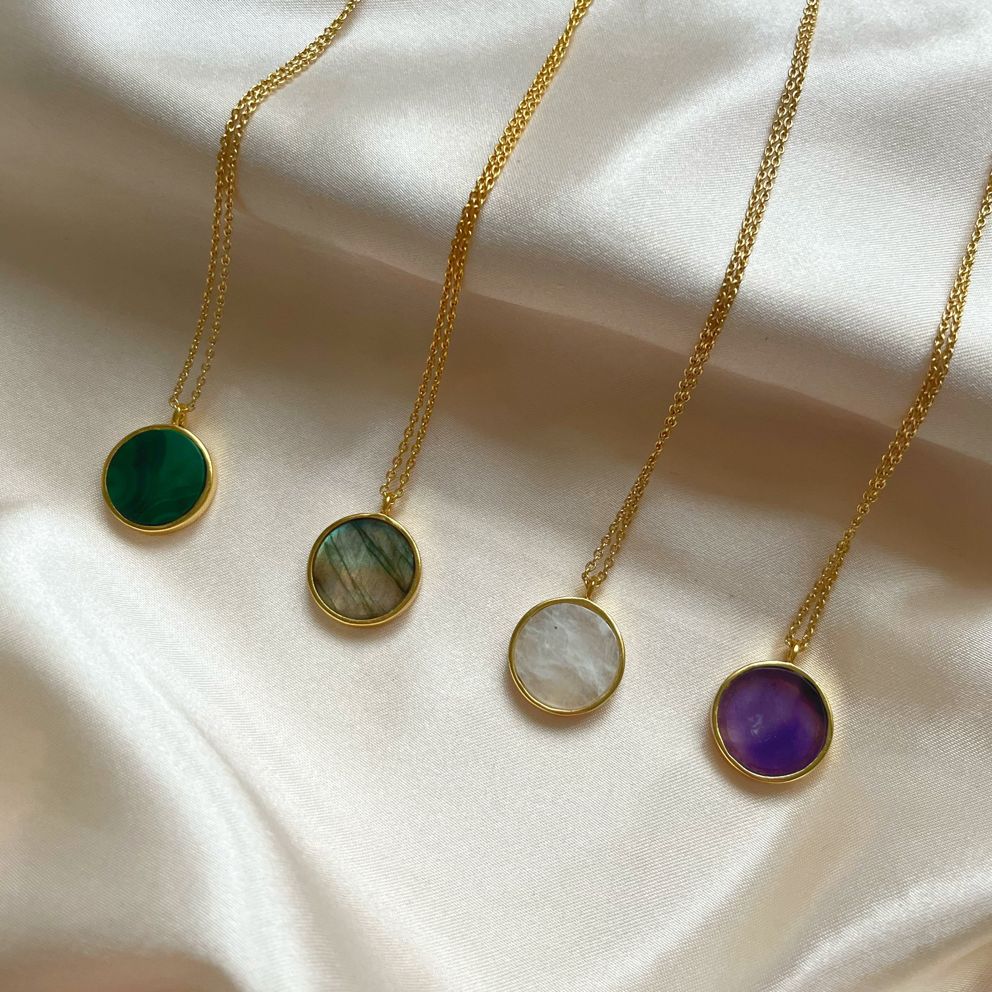 Gemstone coin necklaces in Malachite, Labradorite, Moonstone and Amethyst