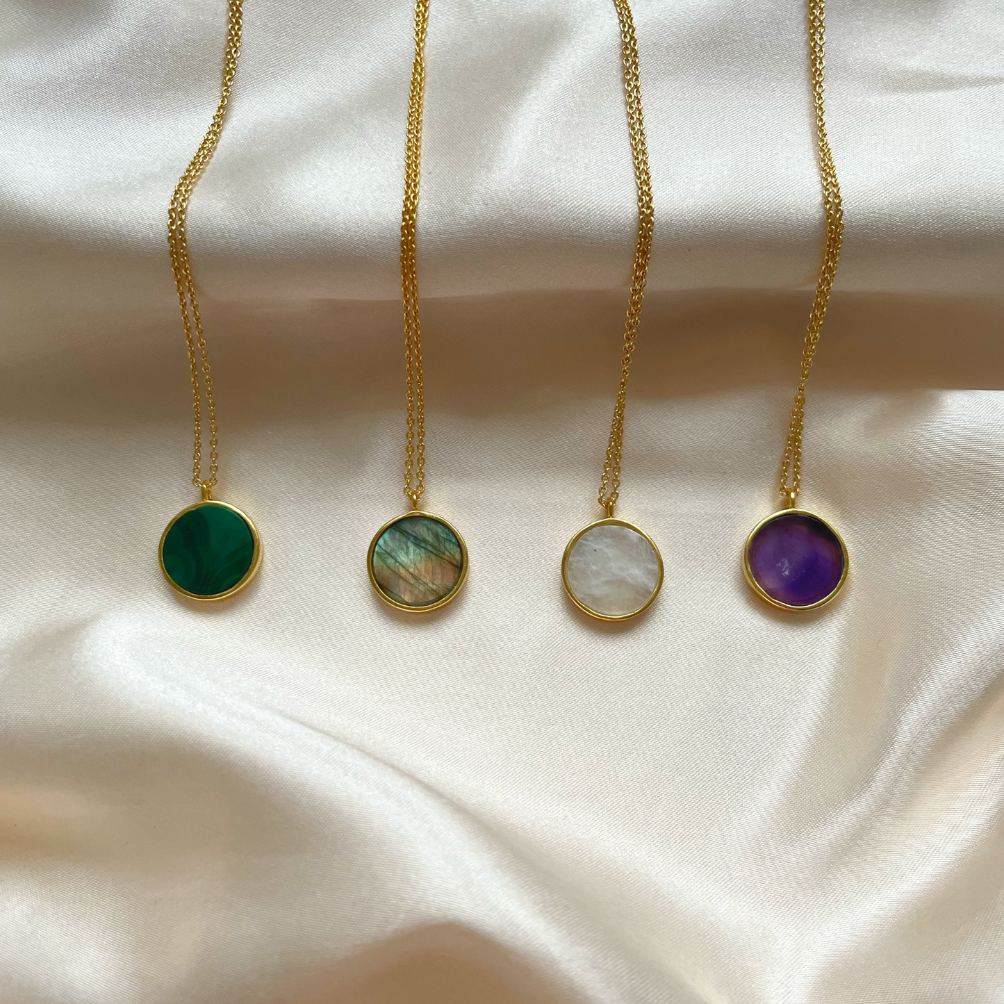 Gemstone coin necklaces in Malachite, Labradorite, Moonstone and Amethyst